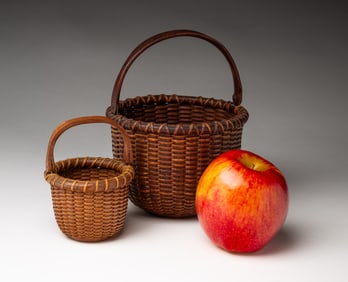 TWO MINIATURE SWING-HANDLED NANTUCKET LIGHTSHIP BASKETS.
