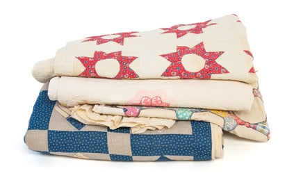 FOUR QUILTED ITEMS.