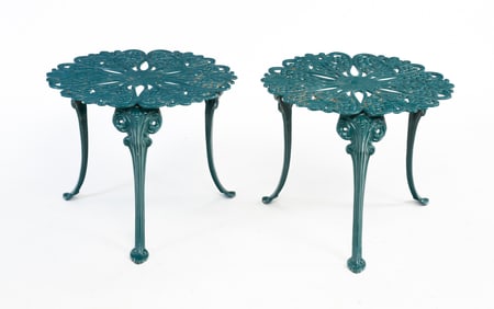 PAIR OF LOW CAST IRON GARDEN TABLES.