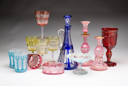 A SELECTION OF CUT OVERLAY GLASS.