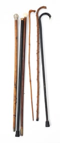 GROUP OF SIX FOLK ART CANES OR WALKING STICKS.