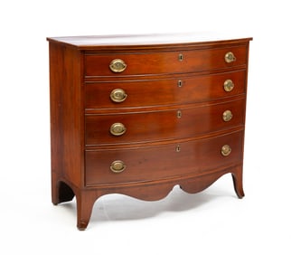 HEPPLEWHITE BOW FRONT CHEST.