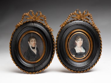 PAIR OF MINIATURE HUSBAND AND WIFE PORTRAITS.