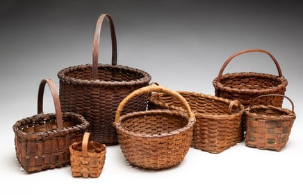 SEVEN HANDLED BASKETS.