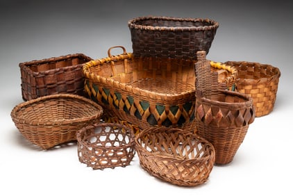 EIGHT FINE WOVEN BASKETS.