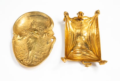 TWO FIRE GILDED BRASS PIN DISHES.