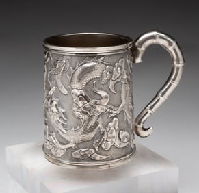CAST STERLING SILVER MUG.