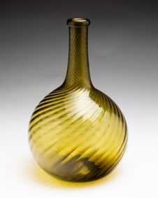 ZANESVILLE SWIRL RIB BLOWN GLASS BOTTLE WITH UNUSUAL COLOR.
