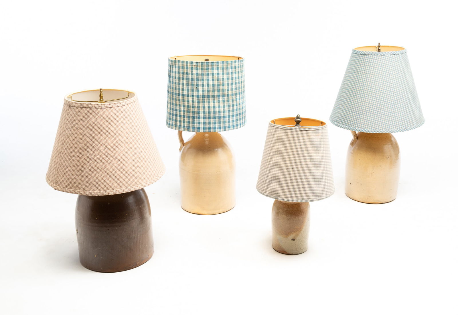 FOUR ELECTRIFIED STONEWARE JUG LAMPS. (1 of 5)