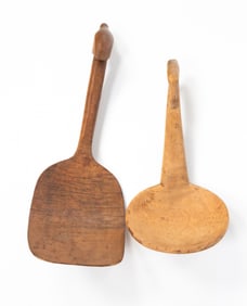 TWO NATIVE AMERICAN CARVED WOOD EFFIGY SPOONS.