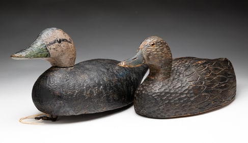 TWO CARVED AND PAINTED DUCK DECOYS.