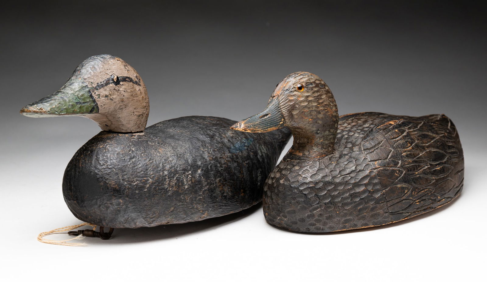 TWO CARVED AND PAINTED DUCK DECOYS. (1 of 7)