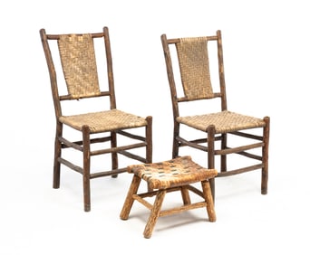 TWO ADIRONDACK OLD HICKORY STYLE SIDE CHAIRS AND AN OTTOMAN.
