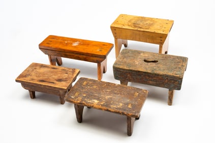 FIVE WOOD FOOTSTOOLS.