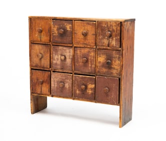 PRIMITIVE TWELVE DRAWER APOTHECARY CHEST.