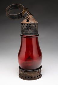 TIN LANTERN WITH RED LENS.