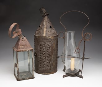 THREE METAL CANDLE LANTERNS.