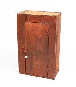 COUNTRY RED PAINTED ONE DOOR CUPBOARD.