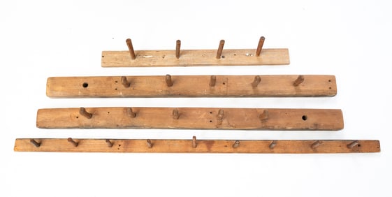 FOUR PRIMITIVE WOOD PEG RAILS.