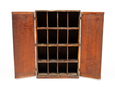 TWO DOOR CUBBY HOLE CABINET.