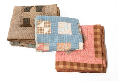 THREE QUILTS IN VARIOUS PATTERNS.