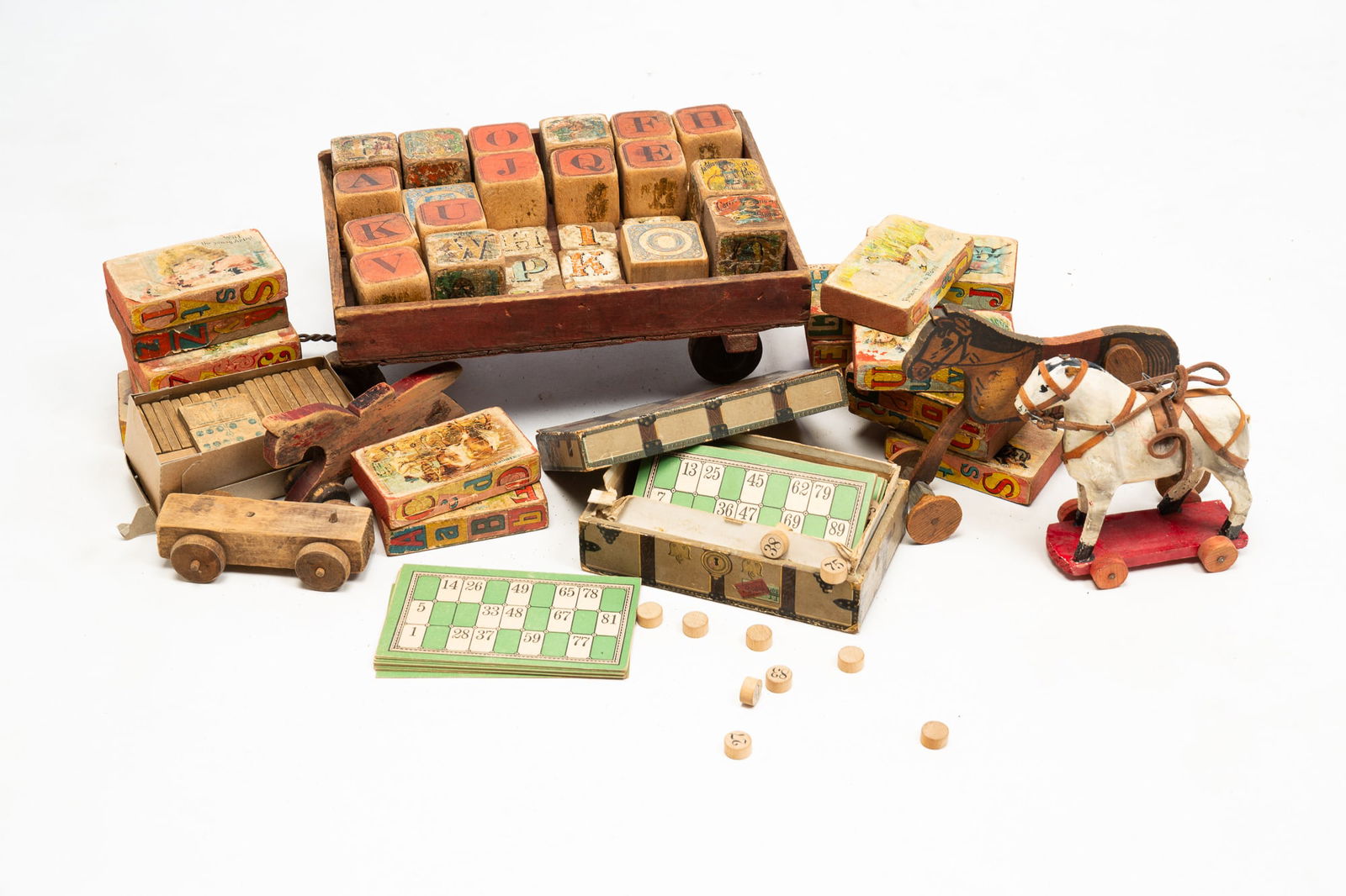 COLLECTION OF ALPHABET BLOCKS, TOYS, AND GAMES. (1 of 4)