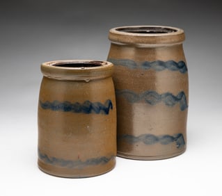 TWO COBALT DECORATED SALT GLAZED STONEWARE JARS.