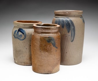 THREE COBALT DECORATED SALT GLAZED STONEWARE JARS.