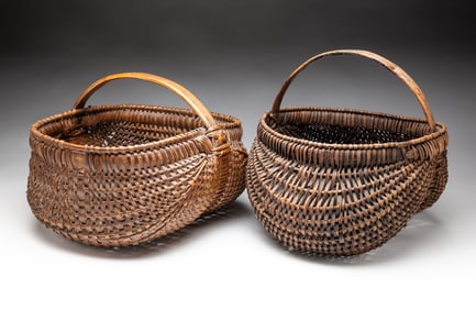 TWO BUTTOCKS BASKETS.