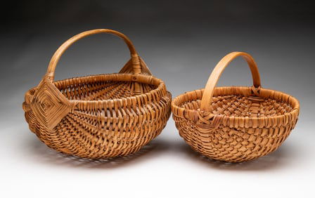 TWO GATHERING BASKETS.