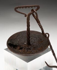 UNUSUAL FORGED IRON HANGING GREASE LAMP.