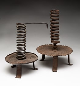 TWO WROUGHT IRON SPIRAL CANDLESTICKS.