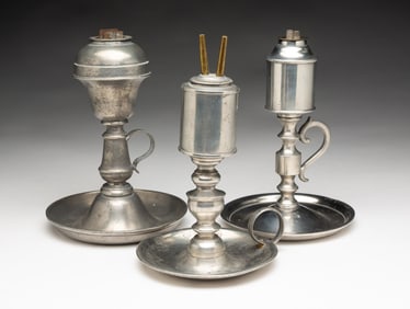 THREE PEWTER FLUID BURNING LAMPS.