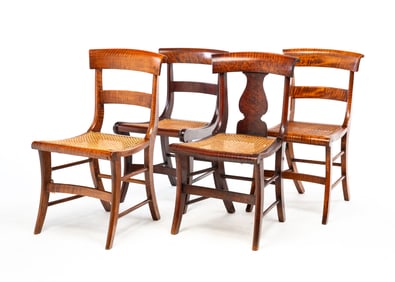 FOUR SABER LEG CANE SEAT CHAIRS.