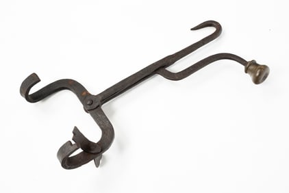 UNUSUAL HAND FORGED IRON KETTLE LIFTER/HANGER.