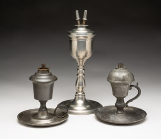THREE PEWTER FLUID BURNING LAMPS.