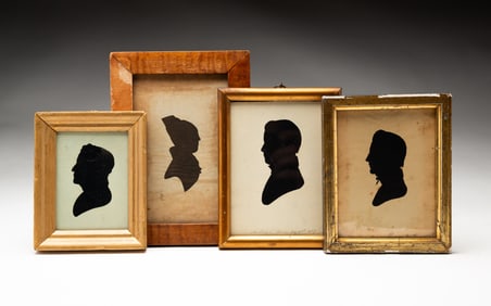 FOUR FRAMED HOLLOW CUT SILHOUETTES.