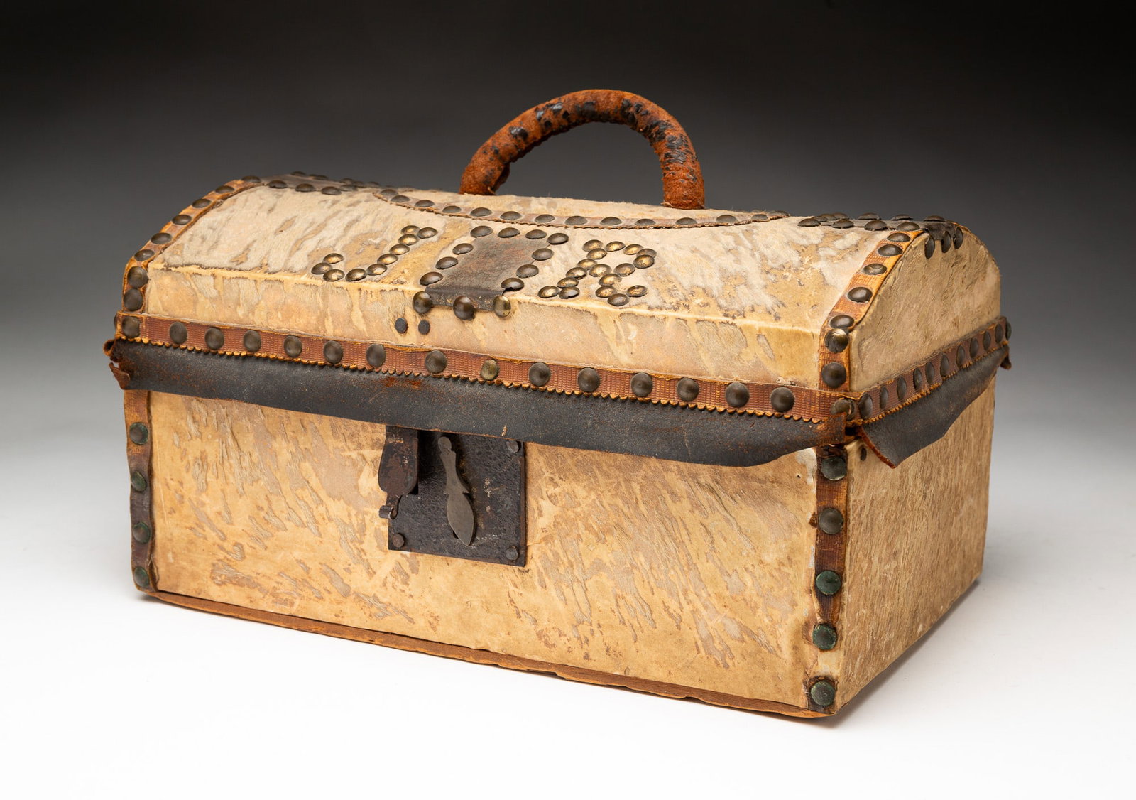 HIDE COVERED DOME TOP BOX WITH BRASS TACK TRIM. (1 of 6)