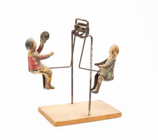 TIN SEESAW TOY BY GIBBS MFG CO. (1 of 7)