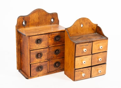 TWO HANGING WOOD SPICE CABINETS.