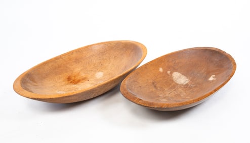 TWO CARVED WOOD TRENCHERS.