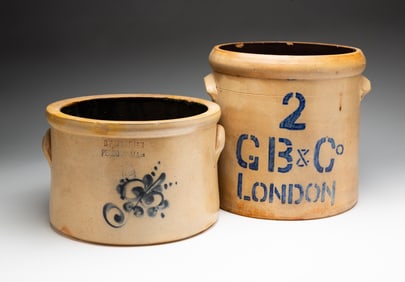 TWO COBALT DECORATED STONEWARE CROCKS.