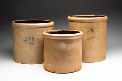 THREE COBALT DECORATED STONEWARE CROCKS.
