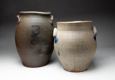 TWO COBALT DECORATED STONEWARE JARS.