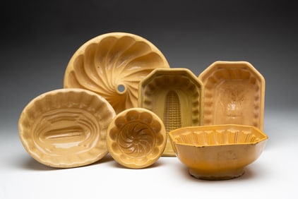 SIX YELLOWWARE FOOD MOLDS.