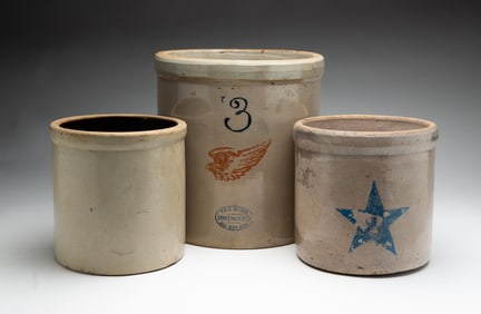 THREE STONEWARE CROCKS.