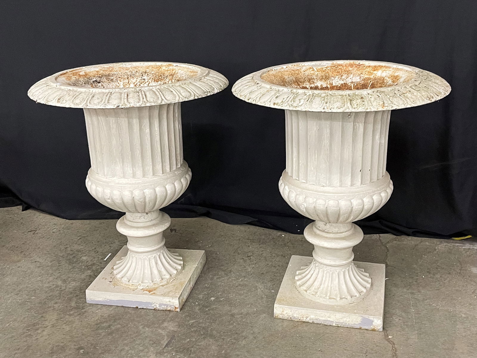 PAIR OF LARGE CLASSICAL CAST IRON URNS. (1 of 3)