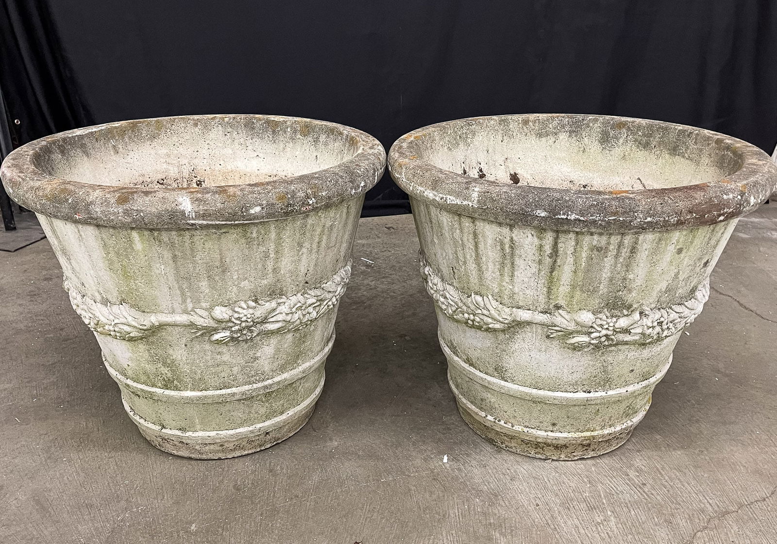 PAIR OF CAST CONCRETE GARDEN URNS. (1 of 2)
