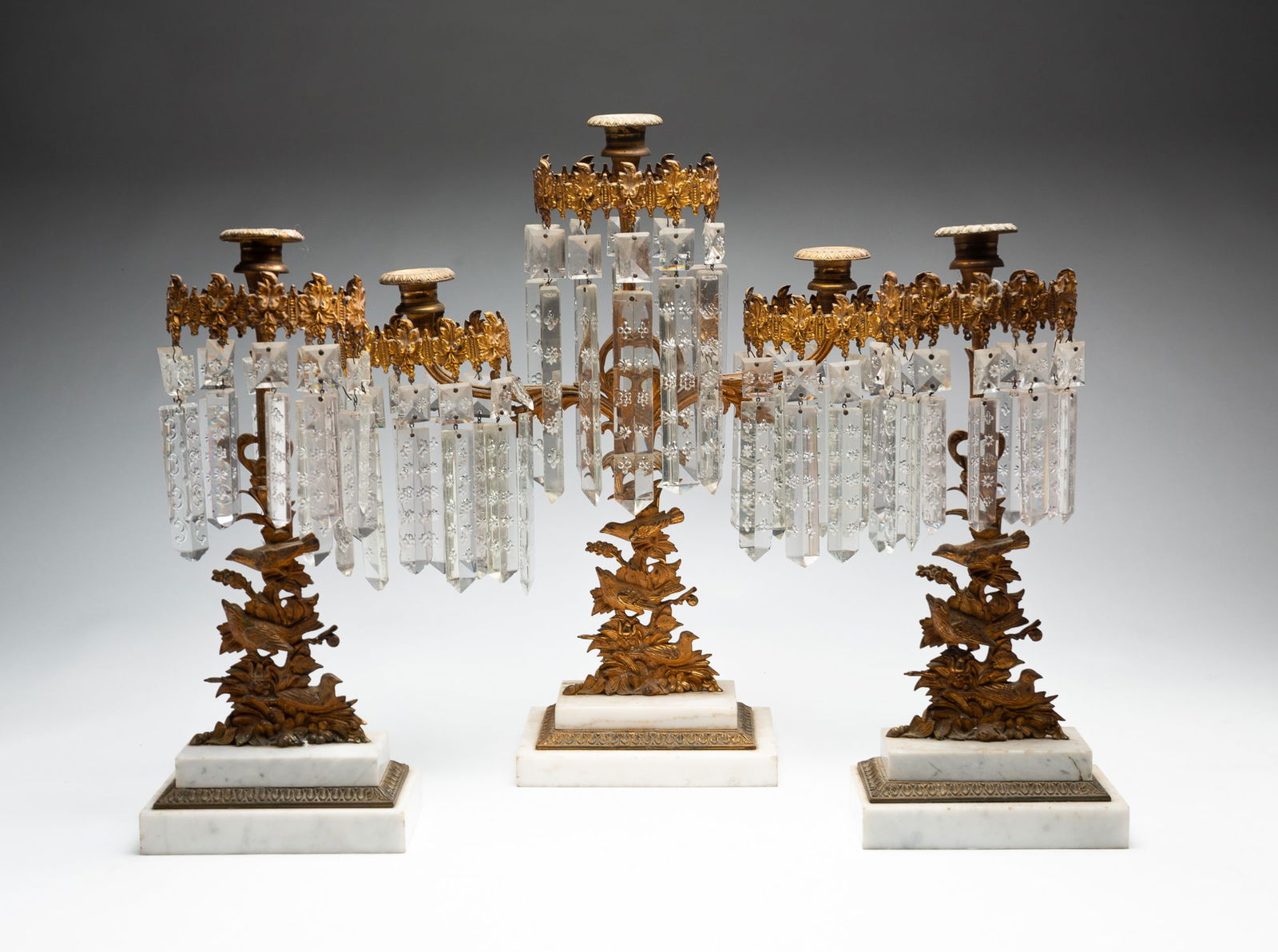 GILDED BRASS GIRANDOLE SET. (1 of 5)