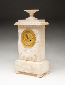 CARVED NEOCLASSICAL ALABASTER MANTEL CLOCK.
